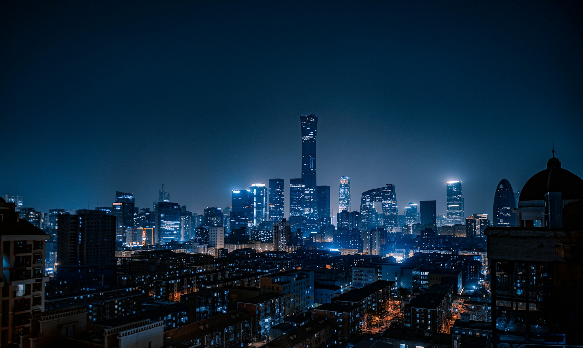 city skyline during night time